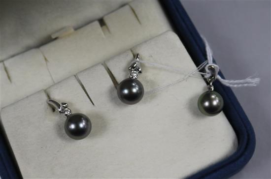 A Mikimoto suite of 18ct white gold, cultured Tahitian pearl and diamond jewellery, comprising a pendant & pair of earrings, pendant